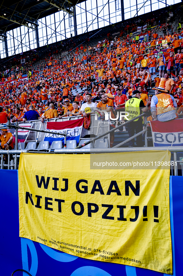 A banner reading ''Wij gaan niet opzij'' is being displayed during the match between the Netherlands and England at the BVB Stadion Dortmund...