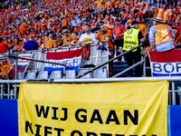 A banner reading ''Wij gaan niet opzij'' is being displayed during the match between the Netherlands and England at the BVB Stadion Dortmund...