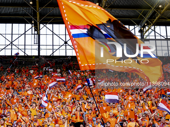 Supporters of the Netherlands are cheering during the match between the Netherlands and England at the BVB Stadion Dortmund for the Semi-fin...