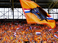 Supporters of the Netherlands are cheering during the match between the Netherlands and England at the BVB Stadion Dortmund for the Semi-fin...