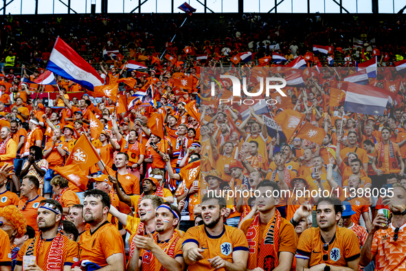 Supporters of the Netherlands are cheering during the match between the Netherlands and England at the BVB Stadion Dortmund for the Semi-fin...