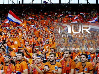 Supporters of the Netherlands are cheering during the match between the Netherlands and England at the BVB Stadion Dortmund for the Semi-fin...