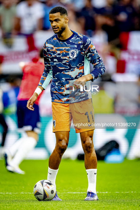 Netherlands forward Cody Gakpo is playing during the match between the Netherlands and England (EURO 2024) at the BVB Stadion Dortmund for t...