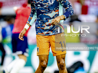 Netherlands forward Cody Gakpo is playing during the match between the Netherlands and England (EURO 2024) at the BVB Stadion Dortmund for t...