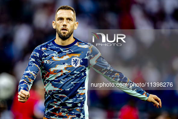 Netherlands defender Stefan de Vrij is playing during the match between the Netherlands and England (EURO 2024) at the BVB Stadion Dortmund...