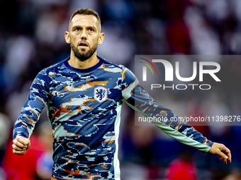 Netherlands defender Stefan de Vrij is playing during the match between the Netherlands and England (EURO 2024) at the BVB Stadion Dortmund...