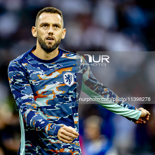 Netherlands defender Stefan de Vrij is playing during the match between the Netherlands and England (EURO 2024) at the BVB Stadion Dortmund...