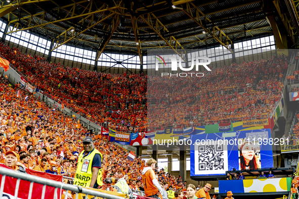 Supporters of the Netherlands are cheering during the match between the Netherlands and England at the BVB Stadion Dortmund for the Semi-fin...