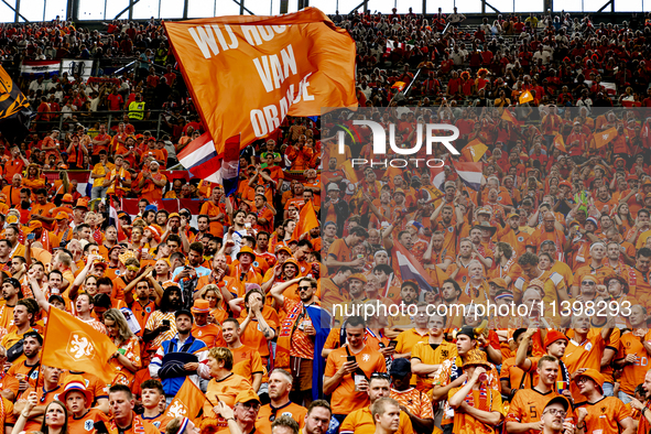 Supporters of the Netherlands are cheering during the match between the Netherlands and England at the BVB Stadion Dortmund for the Semi-fin...