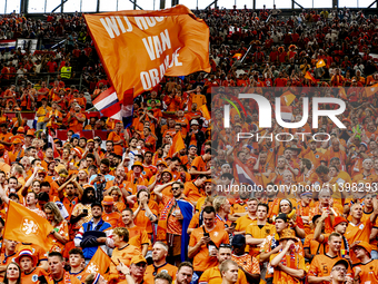 Supporters of the Netherlands are cheering during the match between the Netherlands and England at the BVB Stadion Dortmund for the Semi-fin...