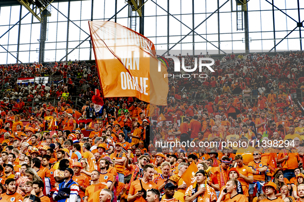 Supporters of the Netherlands are cheering during the match between the Netherlands and England at the BVB Stadion Dortmund for the Semi-fin...