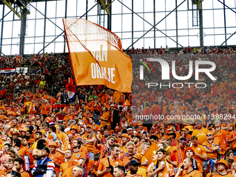 Supporters of the Netherlands are cheering during the match between the Netherlands and England at the BVB Stadion Dortmund for the Semi-fin...