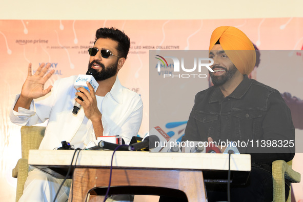 Bollywood actors Vicky Kaushal and Ammy Virk are addressing a press conference during their upcoming movie 'Bad Newz' promotional event in J...