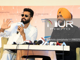 Bollywood actors Vicky Kaushal and Ammy Virk are addressing a press conference during their upcoming movie 'Bad Newz' promotional event in J...