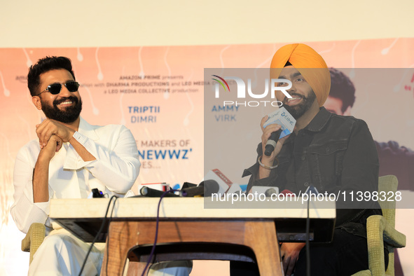 Bollywood actors Vicky Kaushal and Ammy Virk are addressing a press conference during their upcoming movie 'Bad Newz' promotional event in J...