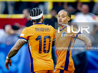 Netherlands forward Xavi Simons is celebrating the goal during the match between the Netherlands and England at the BVB Stadion Dortmund for...