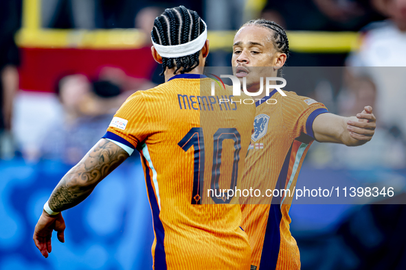 Netherlands forward Xavi Simons is celebrating the goal during the match between the Netherlands and England at the BVB Stadion Dortmund for...