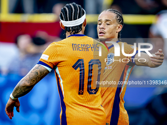 Netherlands forward Xavi Simons is celebrating the goal during the match between the Netherlands and England at the BVB Stadion Dortmund for...