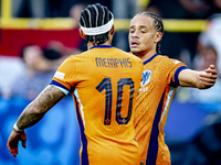 Netherlands forward Xavi Simons is celebrating the goal during the match between the Netherlands and England at the BVB Stadion Dortmund for...