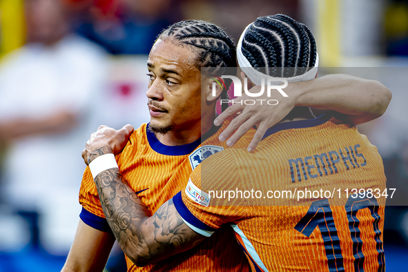 Netherlands forward Xavi Simons is celebrating the goal during the match between the Netherlands and England at the BVB Stadion Dortmund for...