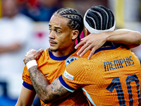 Netherlands forward Xavi Simons is celebrating the goal during the match between the Netherlands and England at the BVB Stadion Dortmund for...