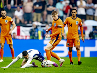 England midfielder Phil Foden and Netherlands midfielder Jerdy Schouten are playing during the match between Netherlands and England at the...