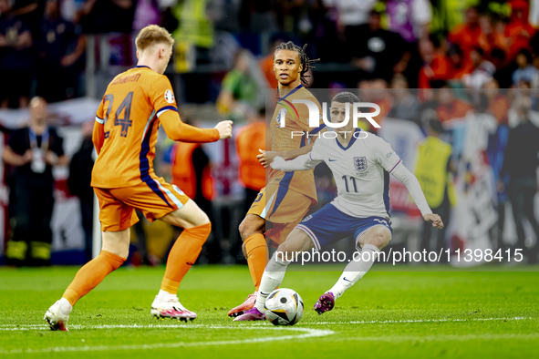 Netherlands midfielder Jerdy Schouten and England midfielder Phil Foden are playing during the match between the Netherlands and England (EU...