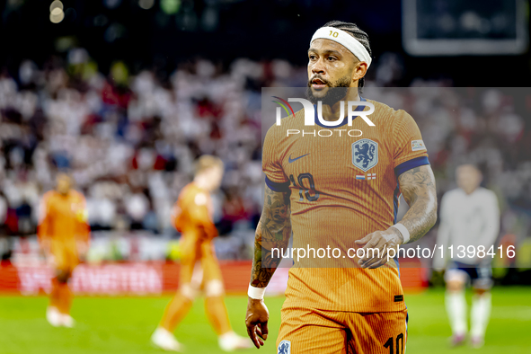 Netherlands forward Memphis Depay is playing during the match between the Netherlands and England (EURO 2024) at the BVB Stadion Dortmund fo...