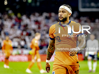 Netherlands forward Memphis Depay is playing during the match between the Netherlands and England (EURO 2024) at the BVB Stadion Dortmund fo...