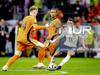 Netherlands midfielder Jerdy Schouten and England midfielder Phil Foden are playing during the match between the Netherlands and England (EU...