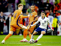 Netherlands midfielder Jerdy Schouten and England midfielder Phil Foden are playing during the match between the Netherlands and England (EU...