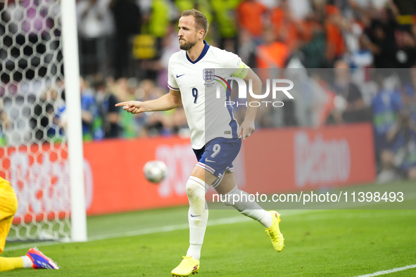 Harry Kane centre-forward of England and Bayern Munich celebrates after scoring his sides first goal during the UEFA EURO 2024 semi-final ma...