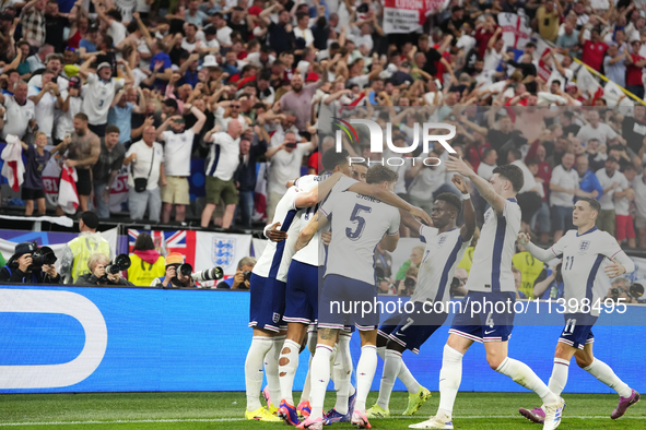 Harry Kane centre-forward of England and Bayern Munich celebrates after scoring his sides first goal during the UEFA EURO 2024 semi-final ma...