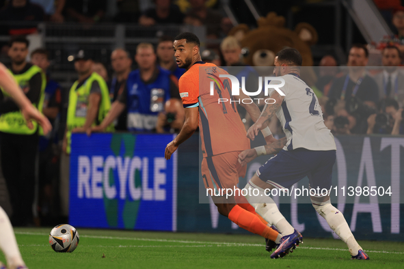 Cody Gakpo (Netherlands) is playing during the Semi Final of the UEFA European Championship between England and Netherlands at the BVB Stadi...