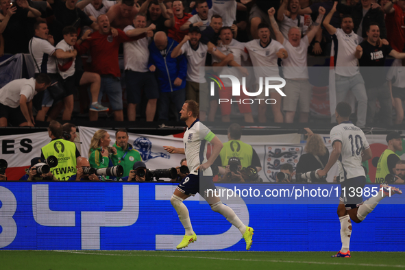 Harry Kane (England) is scoring his team's first goal during the Semi-Final of the UEFA European Championship between England and Netherland...