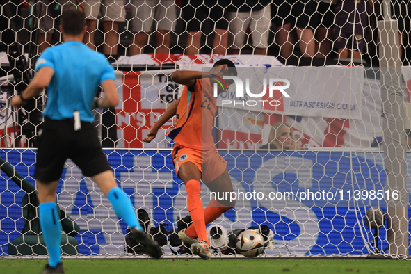 Denzel Dumfries (Netherlands) is clearing off the line during the Semi-Final of the UEFA European Championship between England and Netherlan...