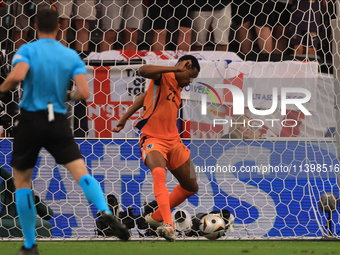 Denzel Dumfries (Netherlands) is clearing off the line during the Semi-Final of the UEFA European Championship between England and Netherlan...