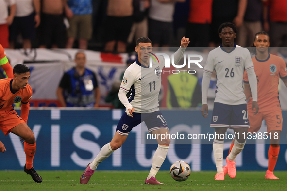 Phil Foden (England) is playing during the Semi Final of the UEFA European Championship between England and Netherlands at the BVB Stadion i...