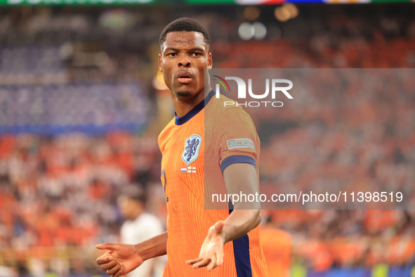 Denzel Dumfries (Netherlands) is playing during the Semi Final of the UEFA European Championship between England and Netherlands at the BVB...