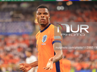 Denzel Dumfries (Netherlands) is playing during the Semi Final of the UEFA European Championship between England and Netherlands at the BVB...