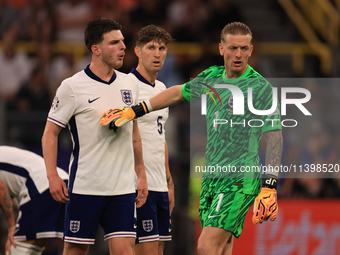 Declan Rice (England) is having heated words with Jordan Pickford (England) during the Semi Final of the UEFA European Championship between...