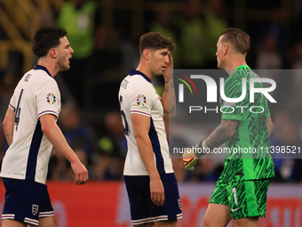 Declan Rice (England) is having heated words with Jordan Pickford (England) during the Semi Final of the UEFA European Championship between...