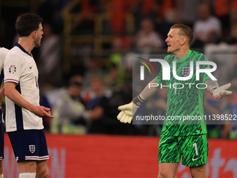 Declan Rice (England) is having heated words with Jordan Pickford (England) during the Semi Final of the UEFA European Championship between...