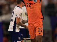 Denzel Dumfries (Netherlands) is hitting the woodwork with a header during the Semi Final of the UEFA European Championship between England...