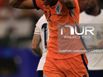 Denzel Dumfries (Netherlands) is hitting the woodwork with a header during the Semi Final of the UEFA European Championship between England...