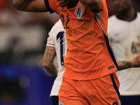 Denzel Dumfries (Netherlands) is hitting the woodwork with a header during the Semi Final of the UEFA European Championship between England...