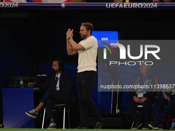 Gareth Southgate, England manager, is applauding during the Semi Final of the UEFA European Championship between England and Netherlands at...