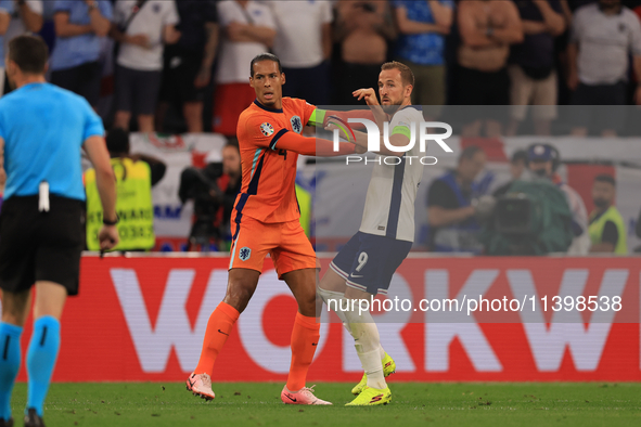 Virgil van Dijk (Netherlands) is pushing Harry Kane (England) during the Semi Final of the UEFA European Championship between England and Ne...