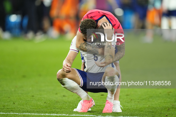 John Stones centre-back of England and Manchester City and Kieran Trippier right-back of England and Newcastle United celebrates victory aft...