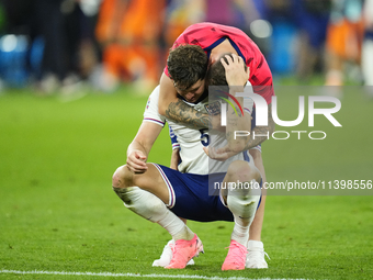 John Stones centre-back of England and Manchester City and Kieran Trippier right-back of England and Newcastle United celebrates victory aft...